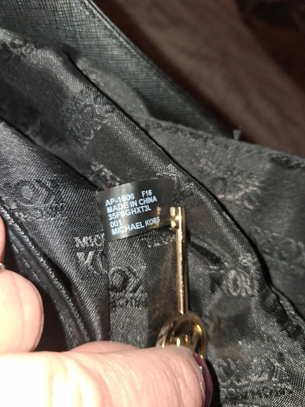 Michael Kors Black Leather Tote with Gold Accent Charm